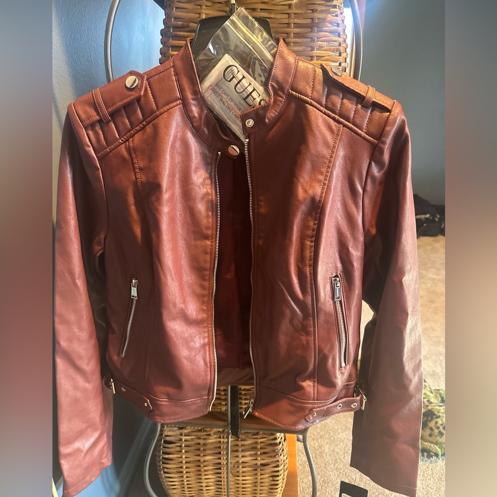 NWT Women’s Guess faux leather jacket in wine. Looks really high quality.